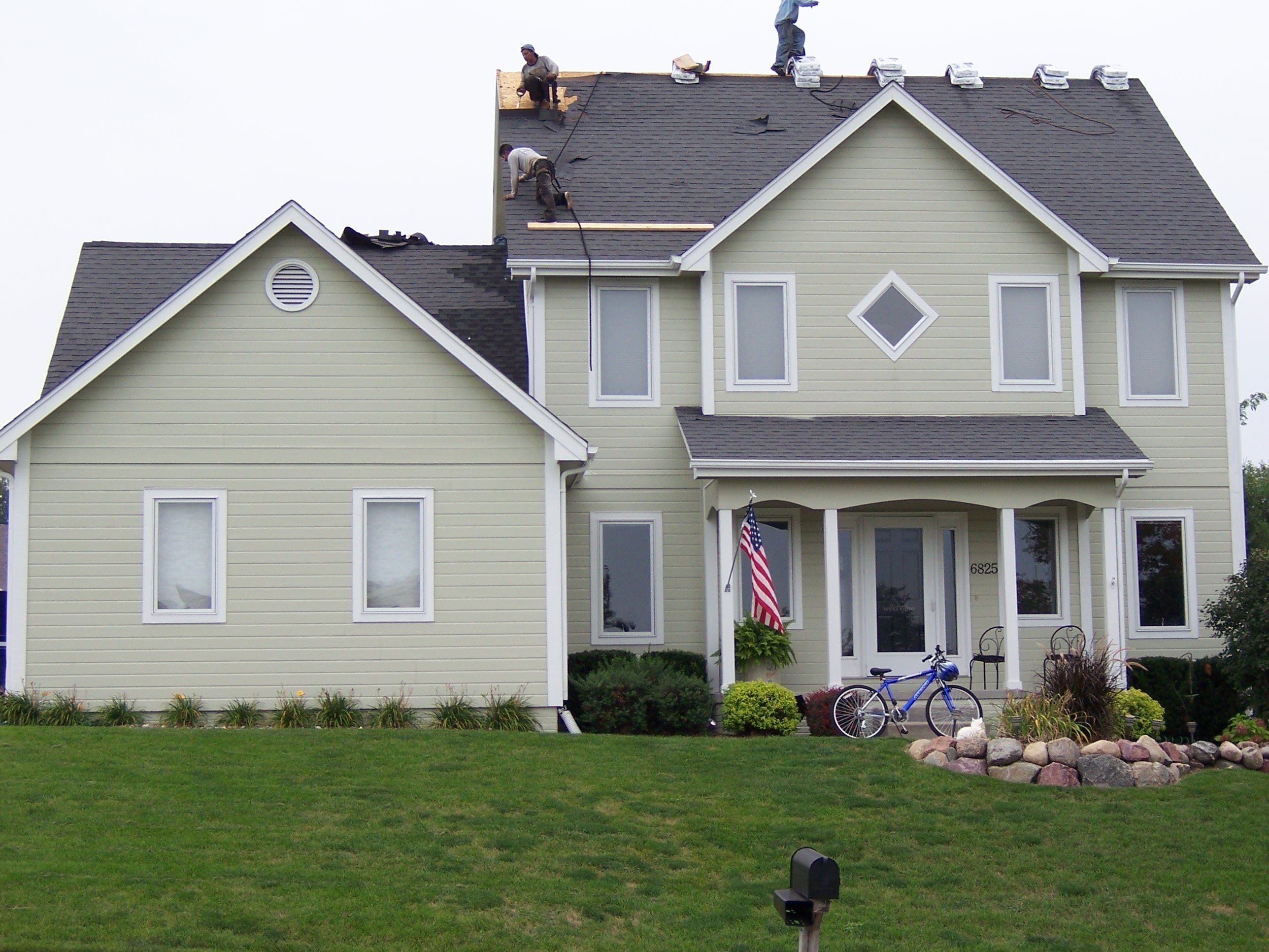 Roof after full replacement — clean new shingles