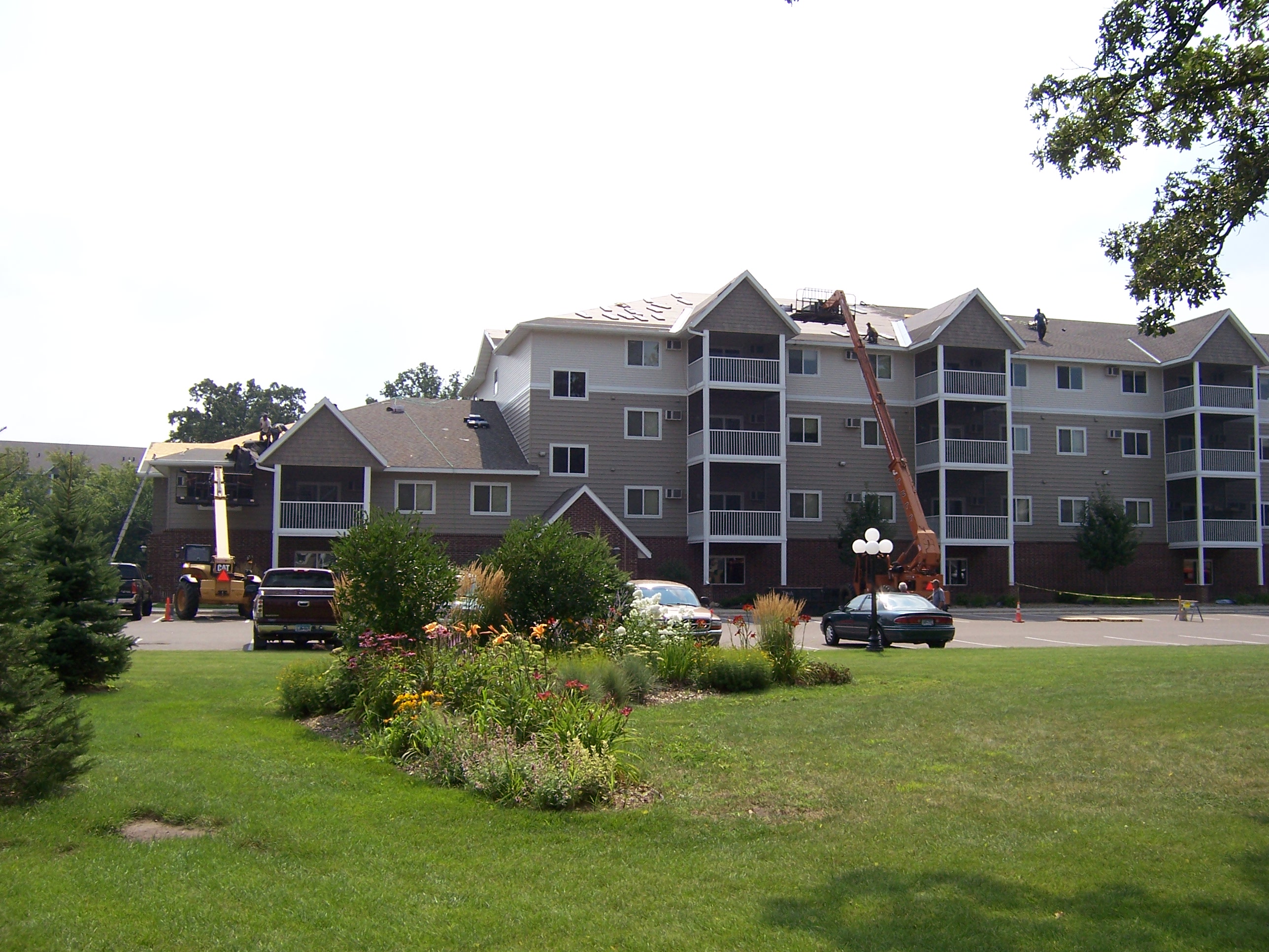 Hail damage roof restoration on colonial home in Coon Rapids, MN